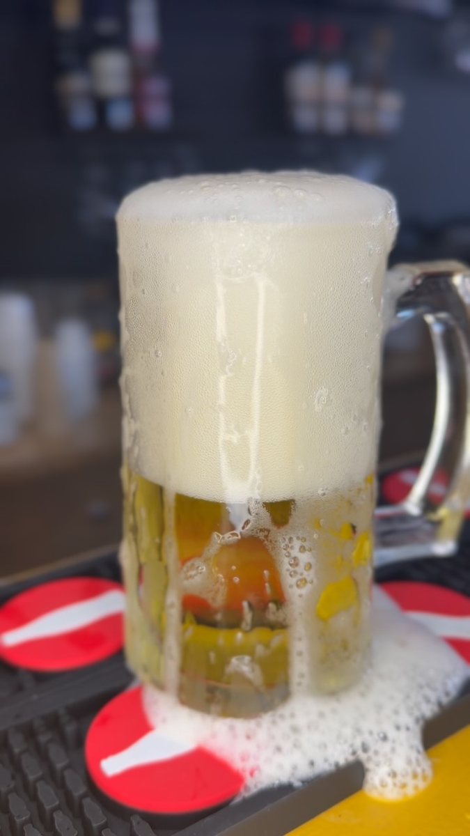 Cold draft beer in a frosted mug