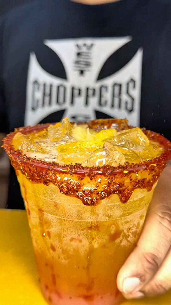 Pina Fuego drink with a Tajin rim